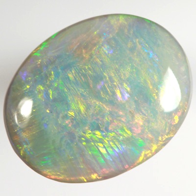SOLID SEMI BLACK OPAL Bright orange, green and yellow over blue. SEE VIDEO